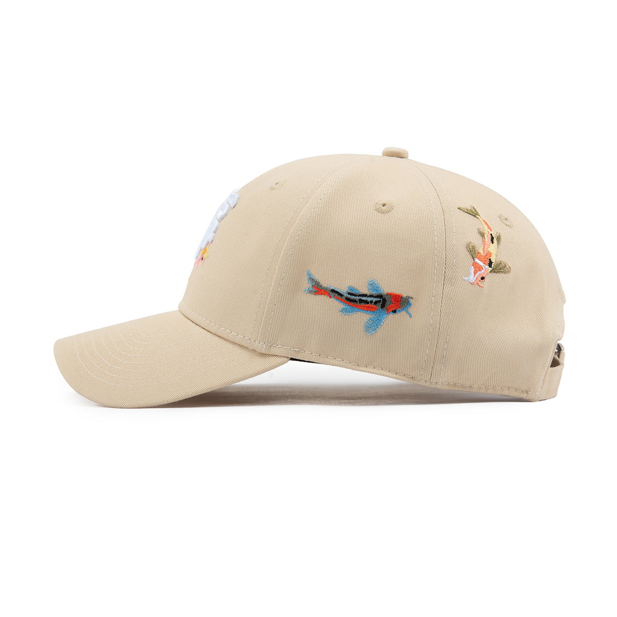 Beige cap with embroidered designs on a white background