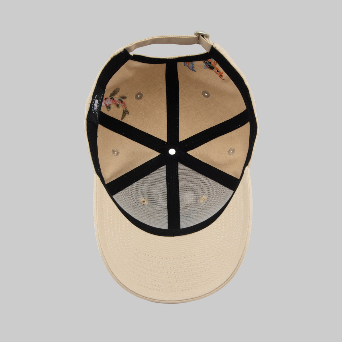 Beige baseball cap with black mesh back on a white background