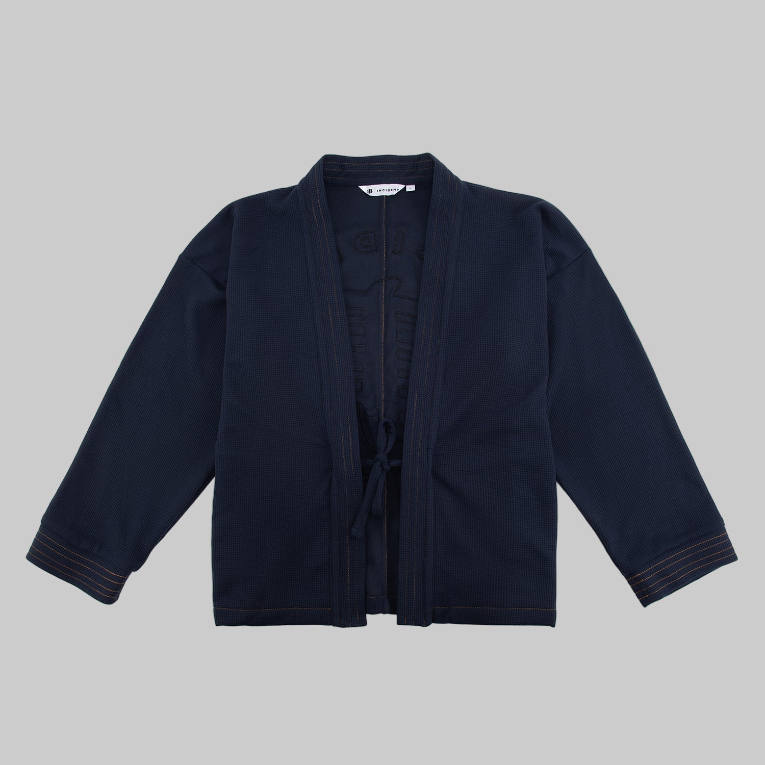 Navy blue haori jacket on a white background