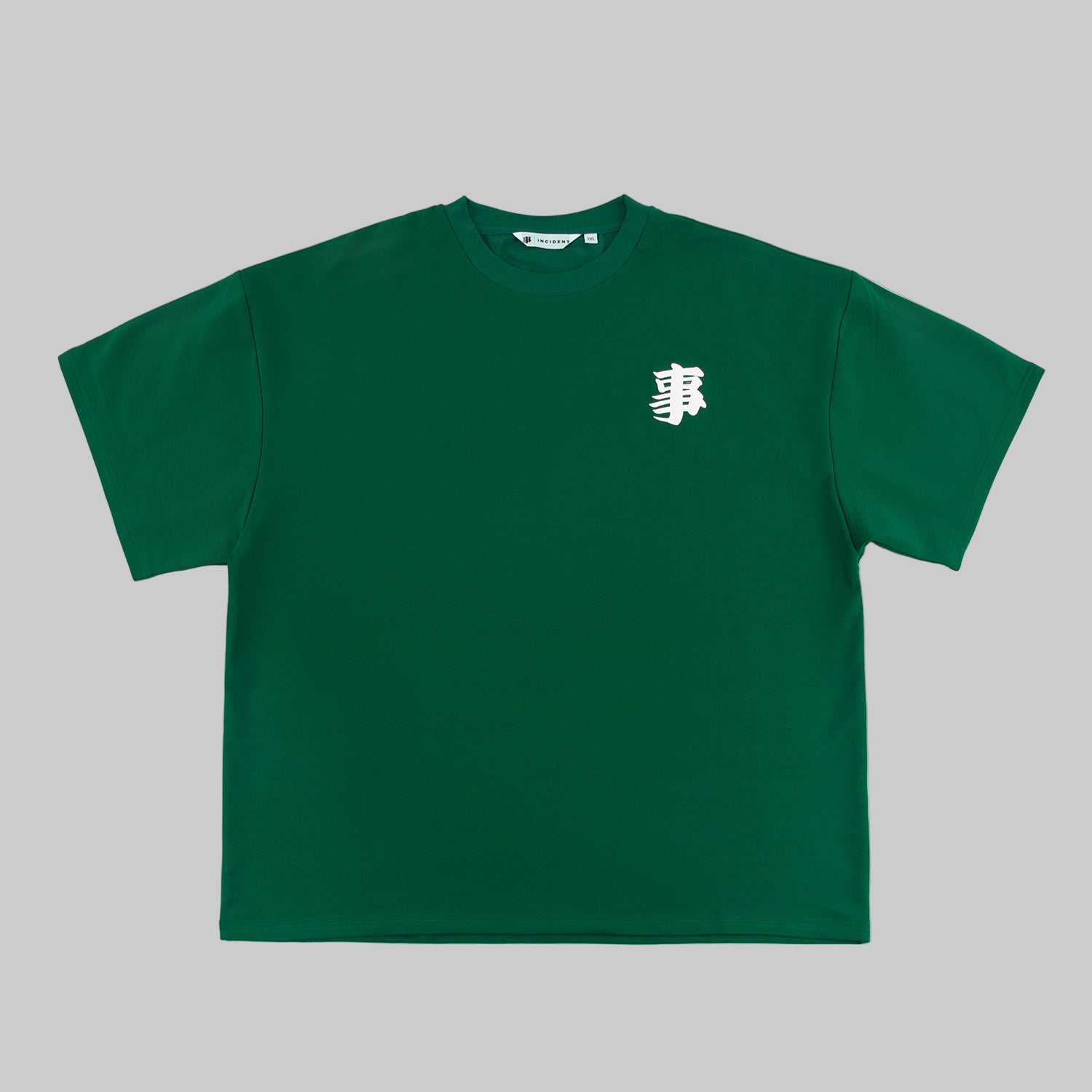 Green t-shirt with a white logo on a white background