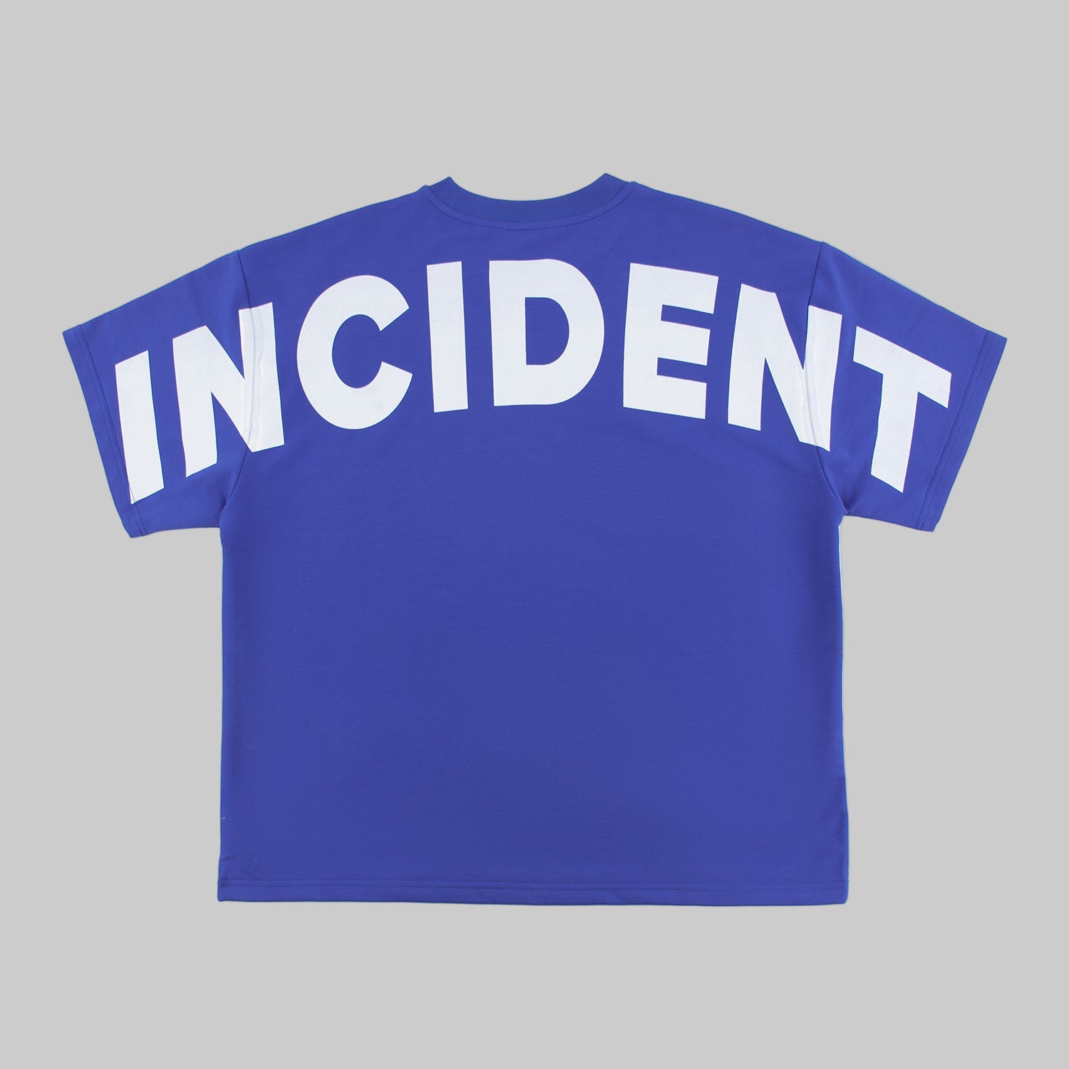 Blue t-shirt with 'INCIDENT' printed on the back against a white background