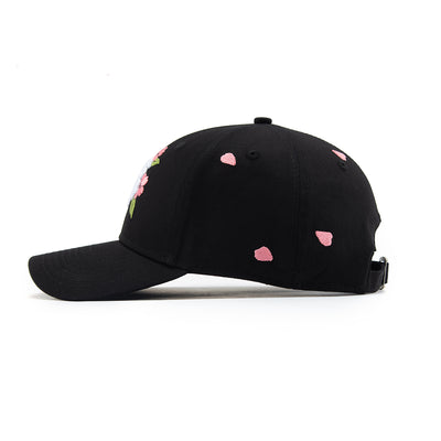 Black cap with pink sakura pettals patterns on a white background