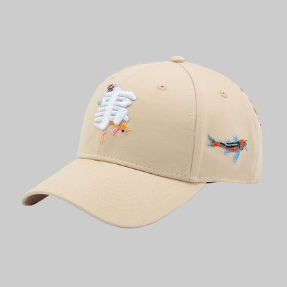 Beige cap with fish skeleton embroidery on a white background