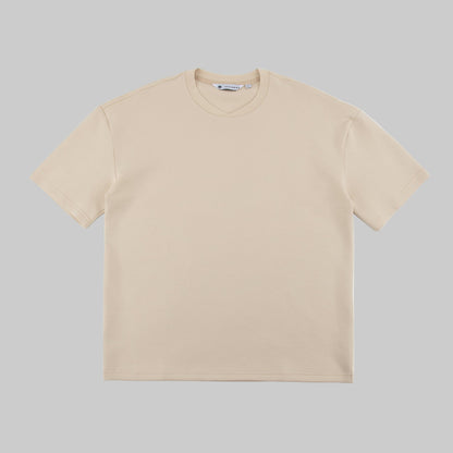 Beige t-shirt on a white background