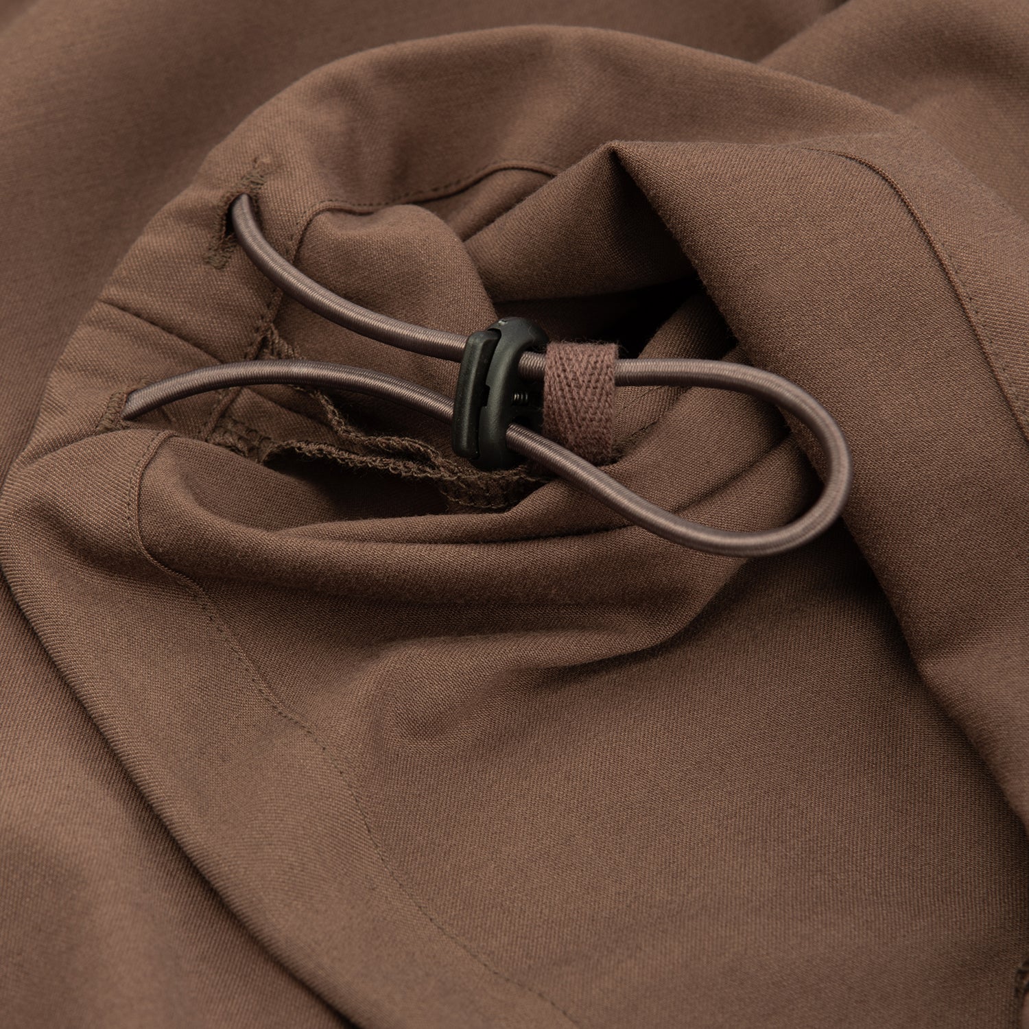 Double Pleated Pants Beige – back pocket button detail