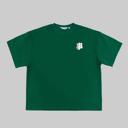 Green t-shirt with a white logo on a white background